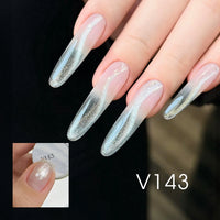MR NAIL V143 Cat Eye Gel Nail Polish showing icy white magnetic shimmer on long almond nails